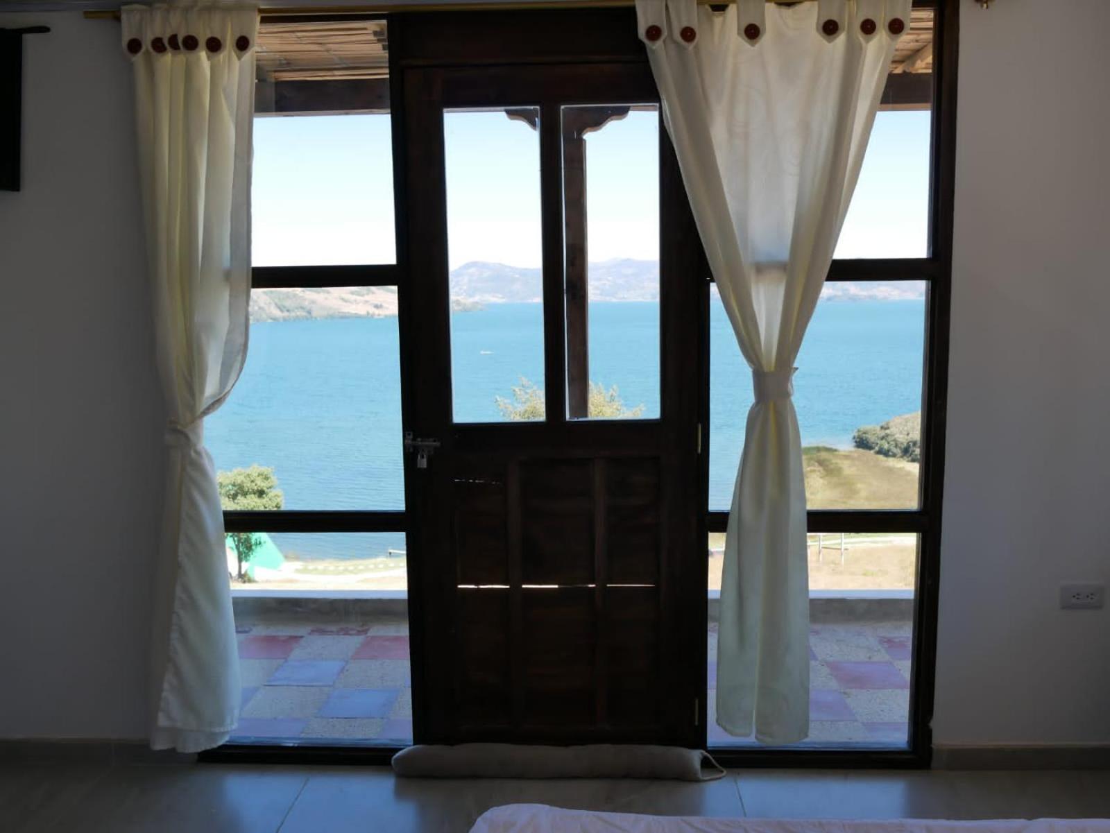 Hotel Tota Eliseo Playa Blanca Lago De โตตา ภายนอก รูปภาพ