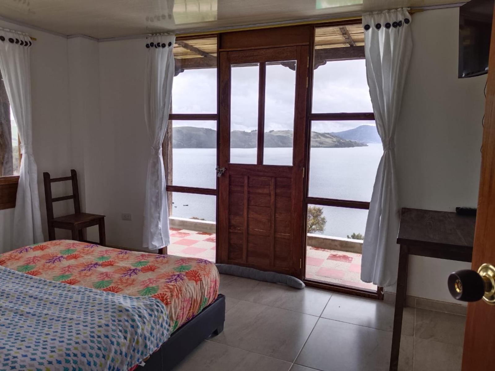 Hotel Tota Eliseo Playa Blanca Lago De โตตา ภายนอก รูปภาพ
